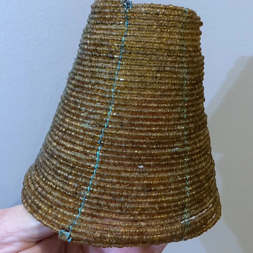 Four beaded lamp shades in gold